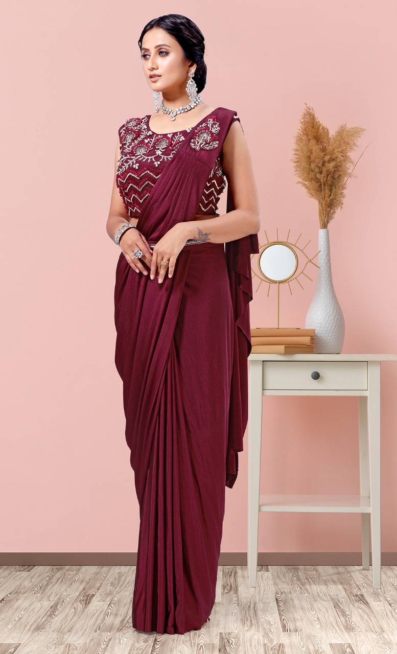 amoha trendz Design No 1015602 Imported Lycra innovative look saree catalog