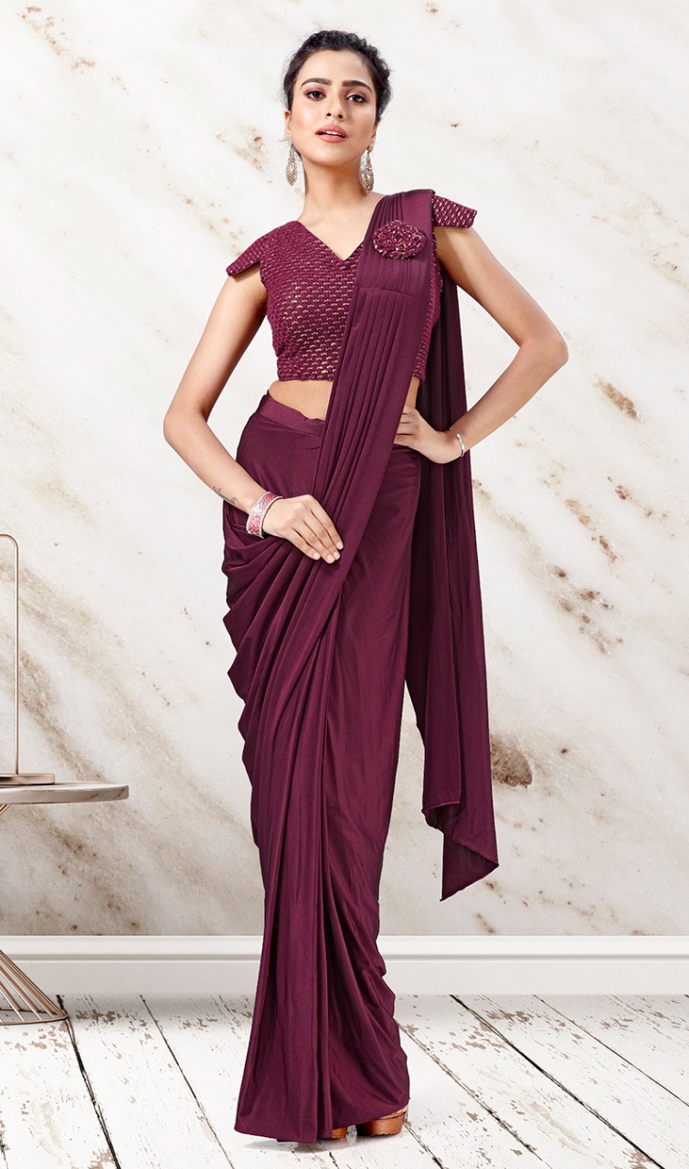 amoha trendz Design No 1015608 Imported lycra elegant look saree catalog