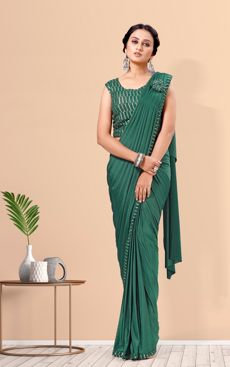 amoha trenza Design No 1015600 Imported Lycra innovative look saree catalog