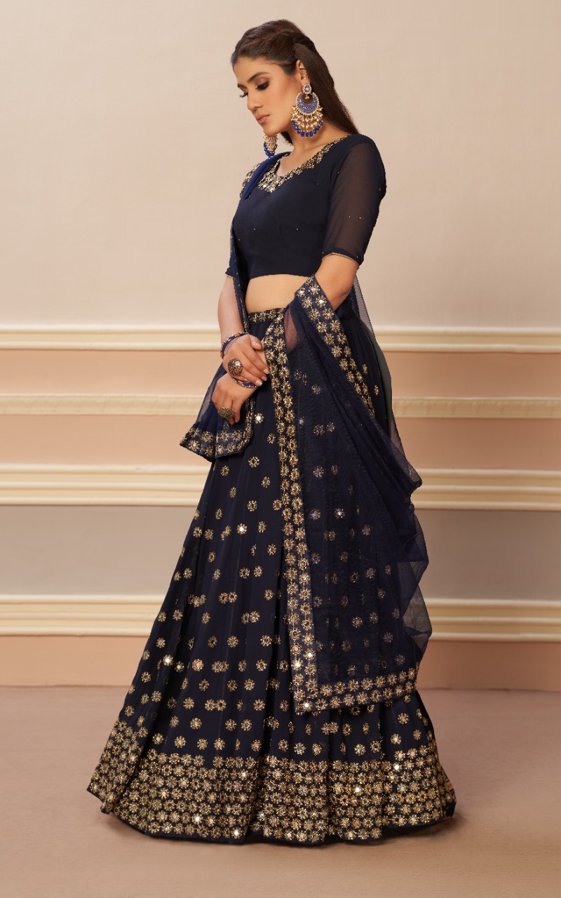 aawiya official 1203 navya blue mirror georgette attractive look lehenga catalog