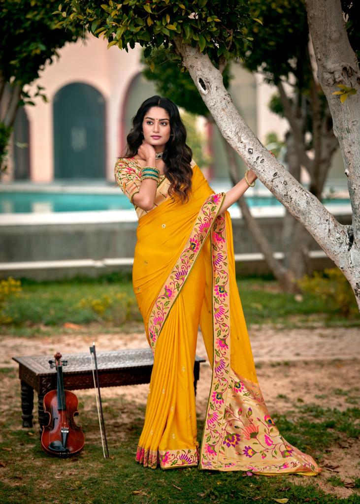 lt kashvi creation saffron silk decent look saree catalog