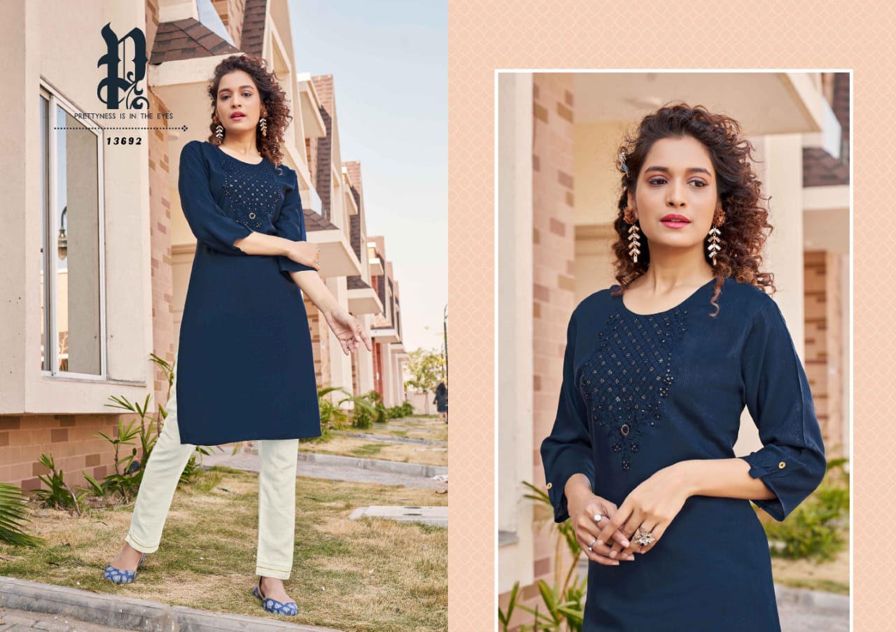 kalaroop by kajree walter rayon decent look kurti catalog